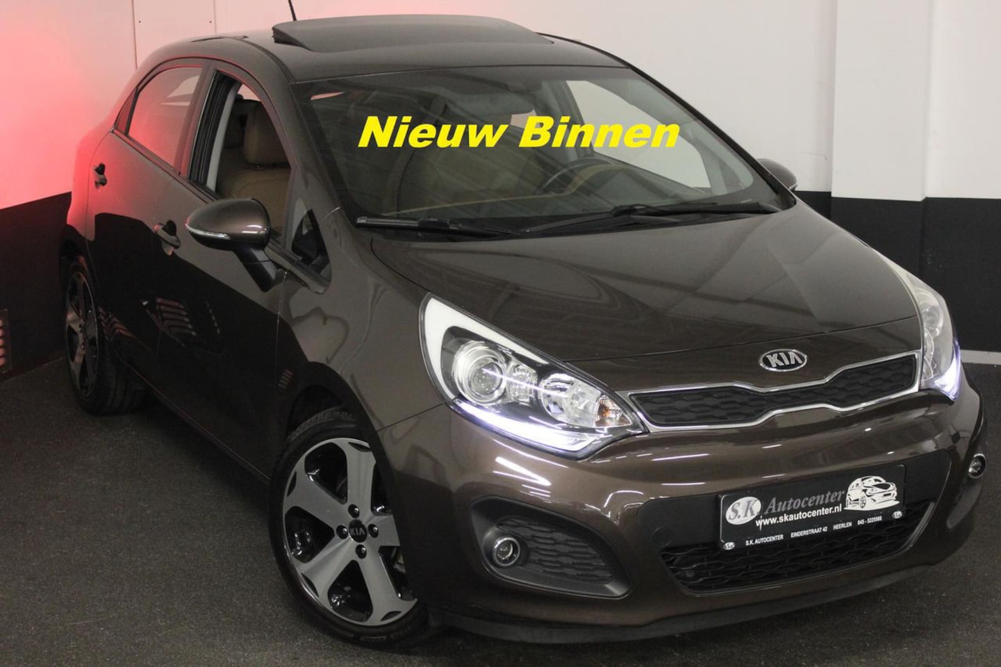 Kia Rio - 1.4I PLATINUM*LEER*CAM*NAV*KEYLESS*PANO*FULL* - AutoWereld.nl