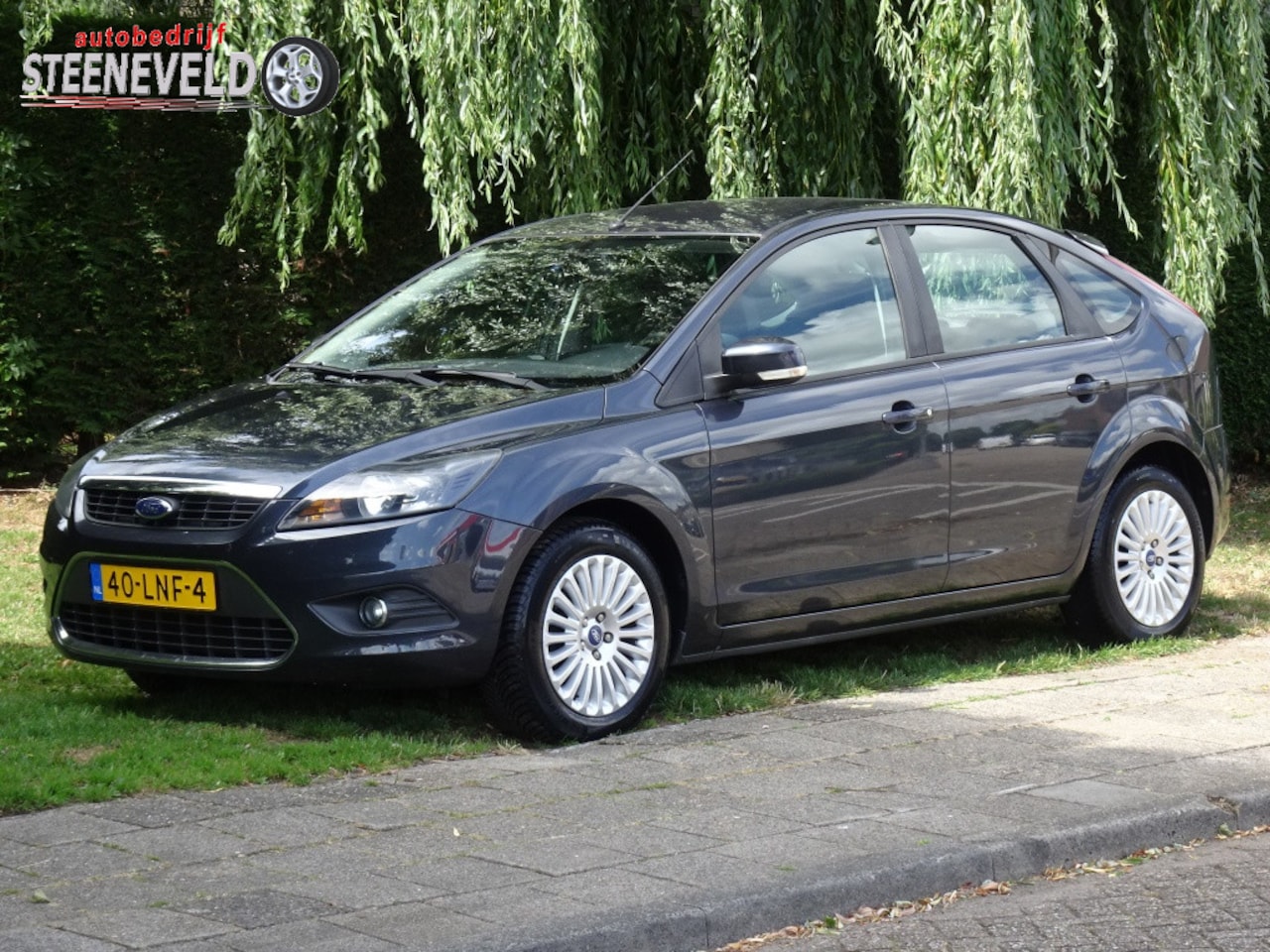 Ford Focus - 1.8 Limited met Navi en PDC - AutoWereld.nl