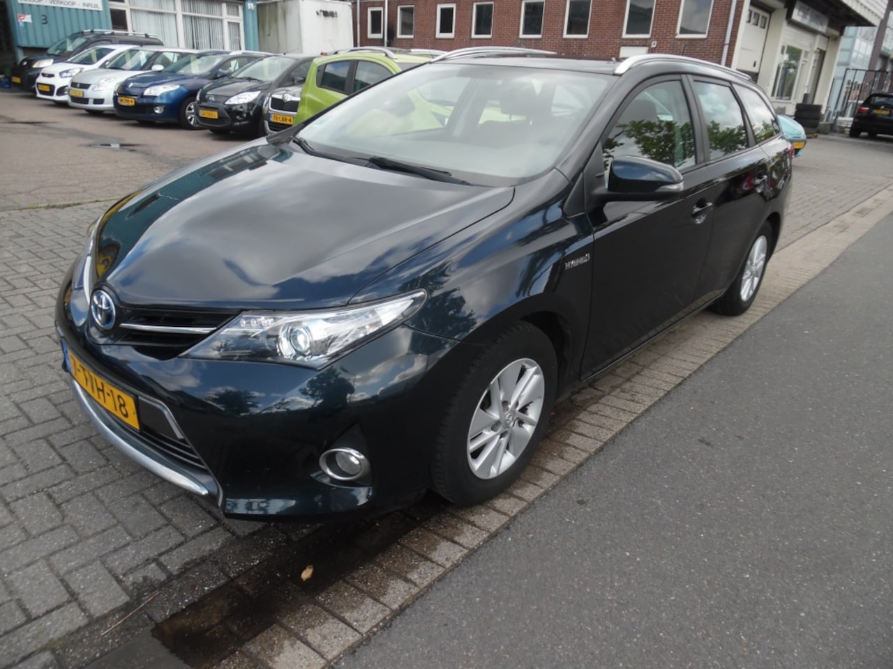 Toyota Auris Touring Sports - apk 7.26 1.8 Hybr. Aspirationb airco - AutoWereld.nl