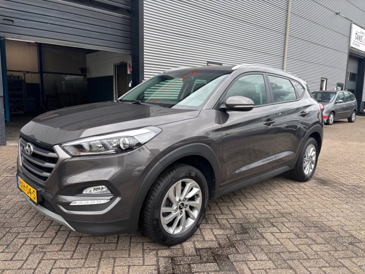Hyundai Tucson - 1.6 GDi Premium 6 MND GAR | LEER | NAVI | CLIMA | CRUISE CONTROL - AutoWereld.nl