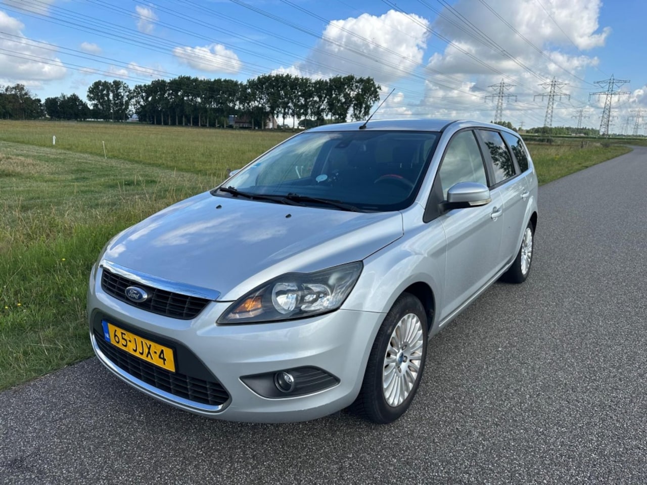 Ford Focus Wagon - 1.6 Titanium CLIMA AIRCO | TREKHAAK | CRUISE CONTROL ! - AutoWereld.nl