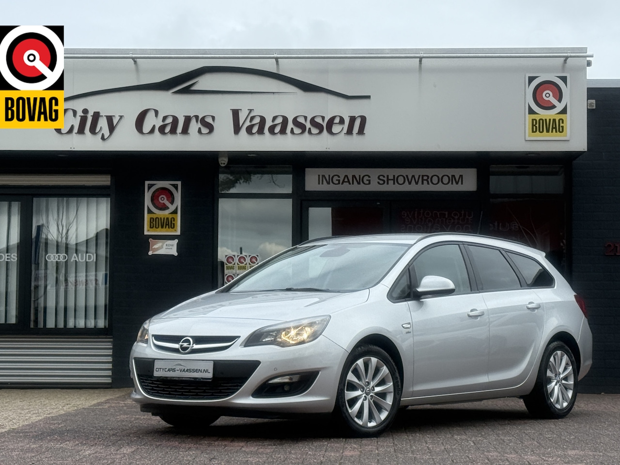 Opel Astra Sports Tourer - 1.4 Turbo Edition 140 pk climate ctr cruise ctr tel voorbereiding stoelverwarming usb aux - AutoWereld.nl