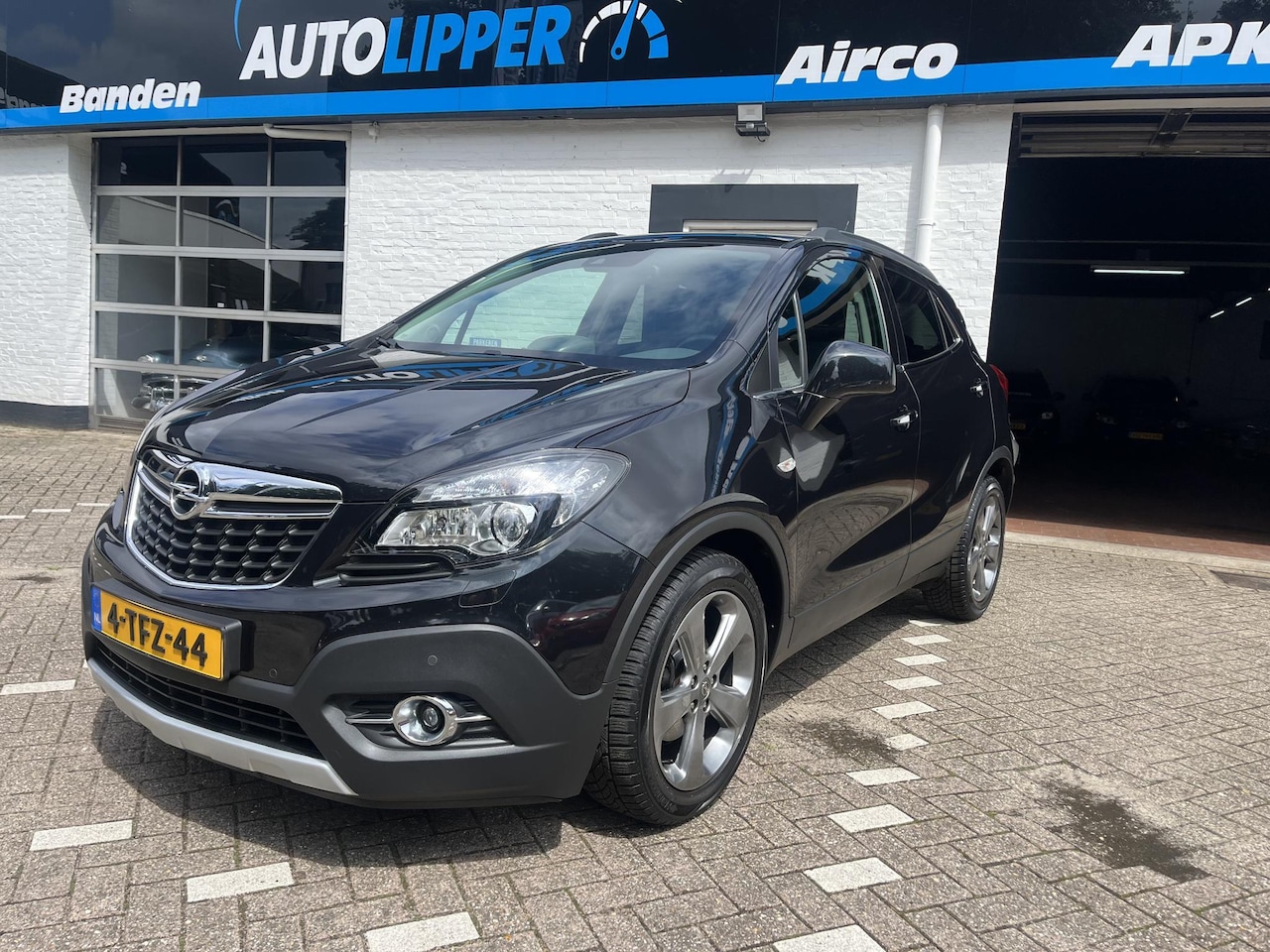 Opel Mokka - 1.4 T Cosmo /Camera/Half leder interieur/Lm velgen/Trekhaak/All season banden/Nieuwe apk b - AutoWereld.nl