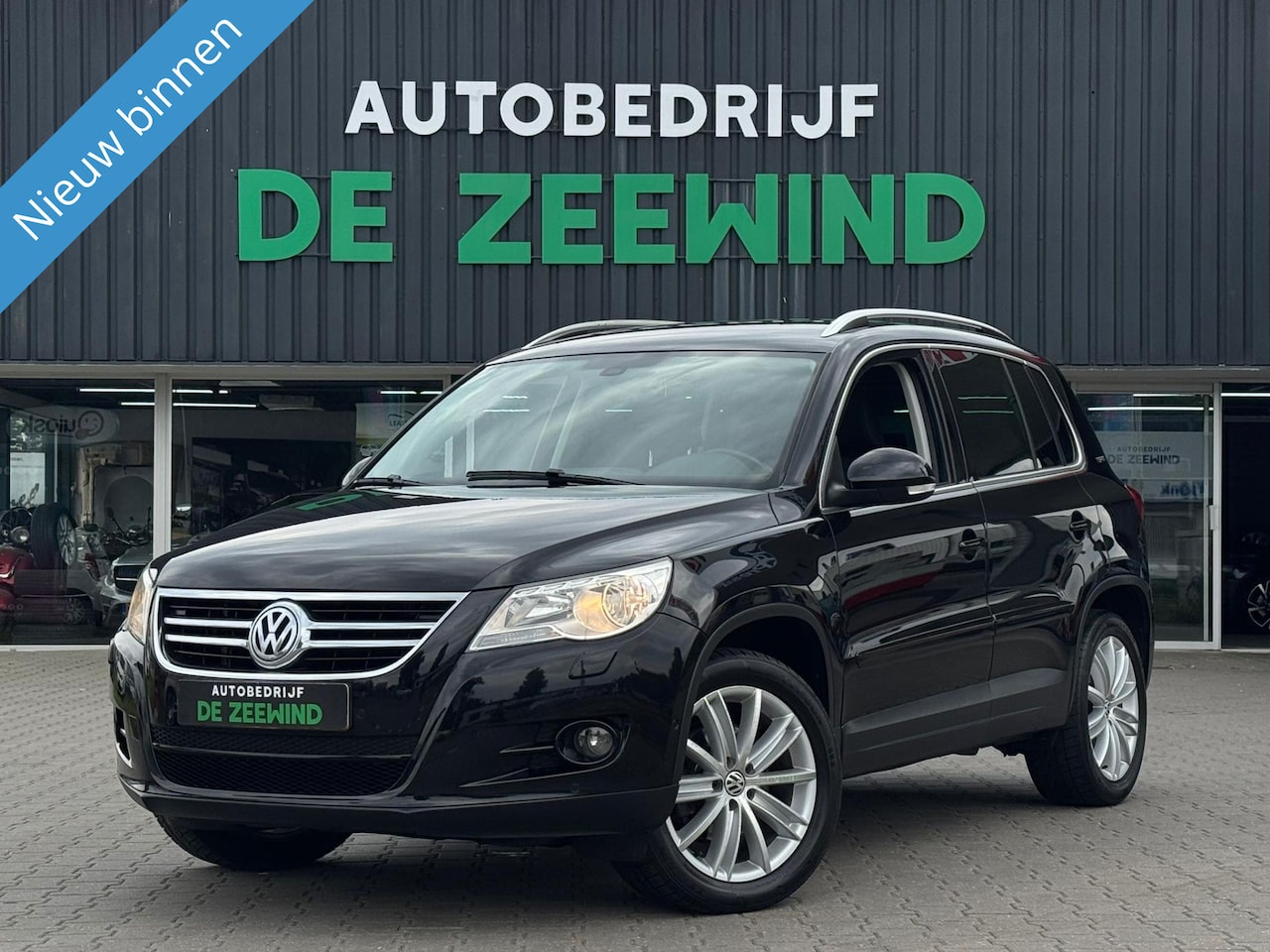 Volkswagen Tiguan - 1.4 TSI Comfort&Design|PDC|Trekhaak|Rijklaar - AutoWereld.nl