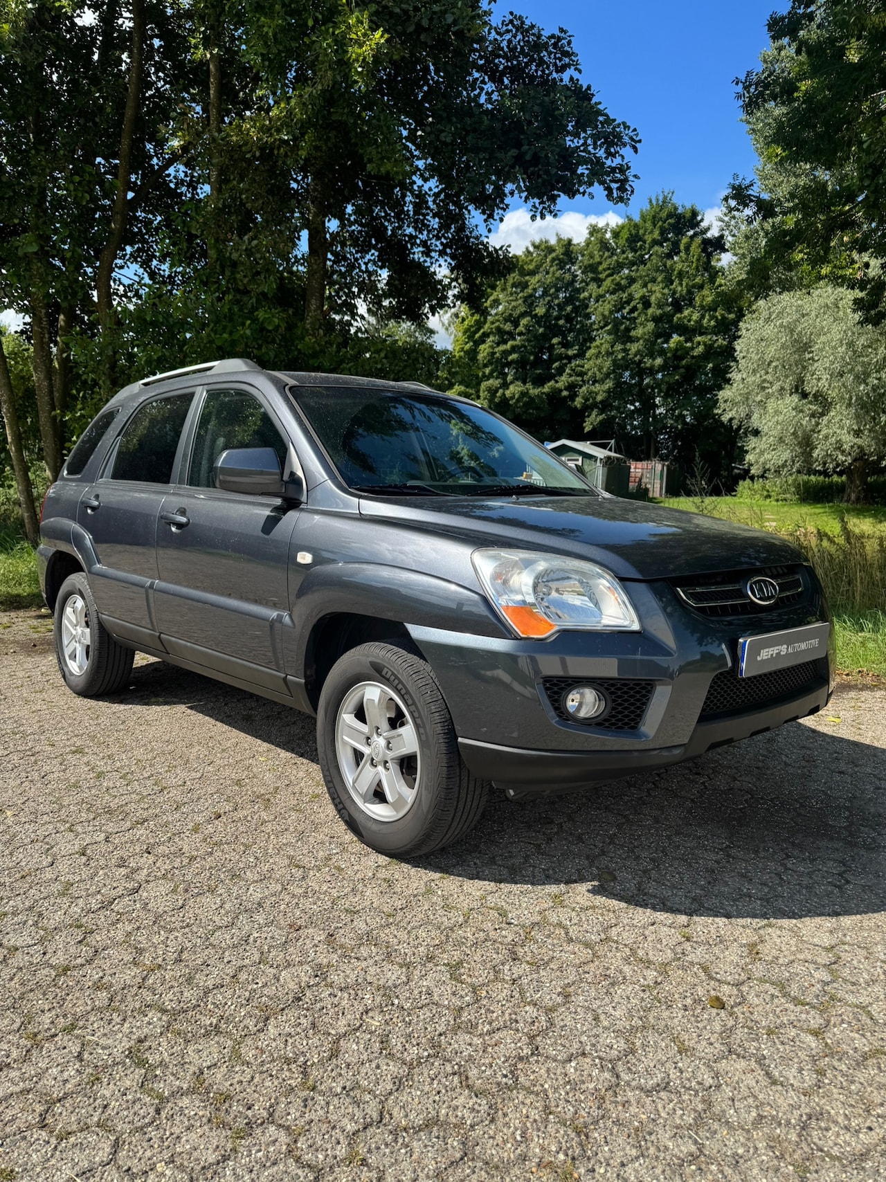 Kia Sportage - 2.0 CVVT Comfort 2.0 CVVT Comfort - AutoWereld.nl