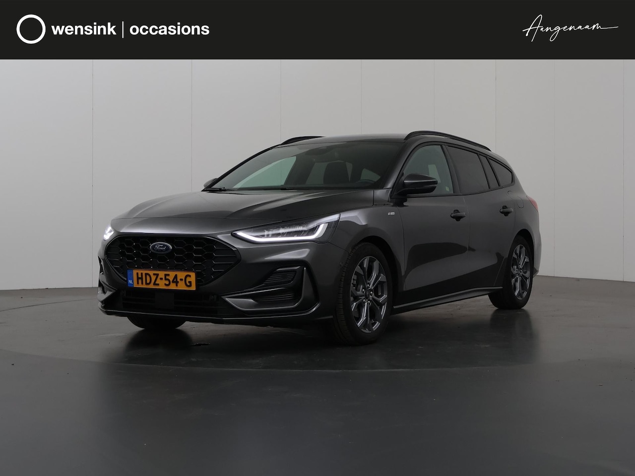 Ford Focus Wagon - 1.0 EcoBoost Hybrid ST Line | Panoramadak | Parkeercamera | Winterpakket | Cruise Control - AutoWereld.nl