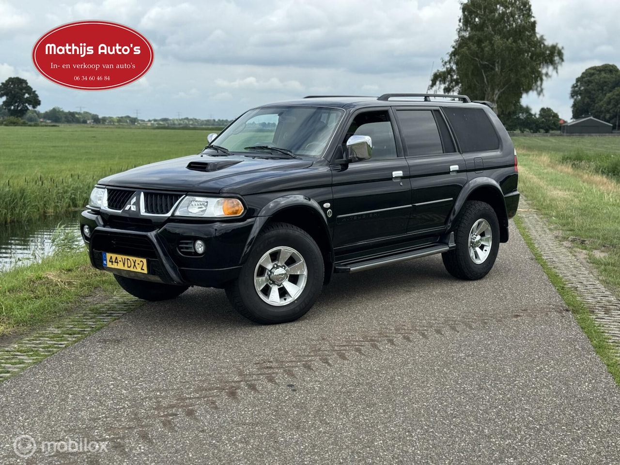 Mitsubishi Pajero Sport - 2.5 TDI Intense Panel Van Grijs kenteken Climate Cruise Marge! - AutoWereld.nl