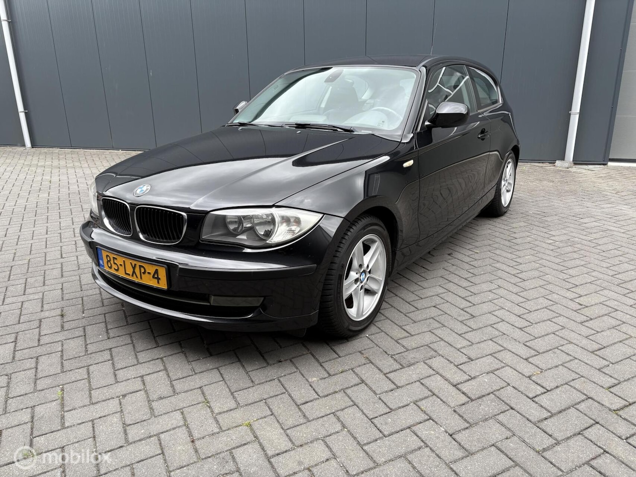 BMW 1-serie - 116i High Executive 116i High Executive (tik in motor) - AutoWereld.nl