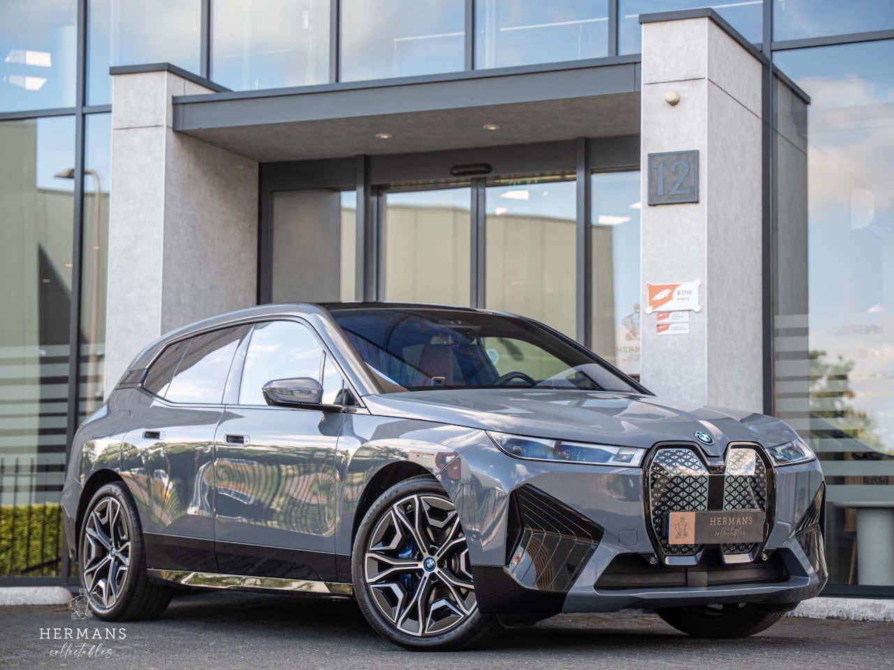 BMW iX - XDrive40 Executive 77 kWh / Org. NL / 1st Owner / Individual / Sky Lounge - AutoWereld.nl