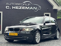 BMW 1-serie - 116i Panoramadak Navigatie Cruise Control PDC Climate Control