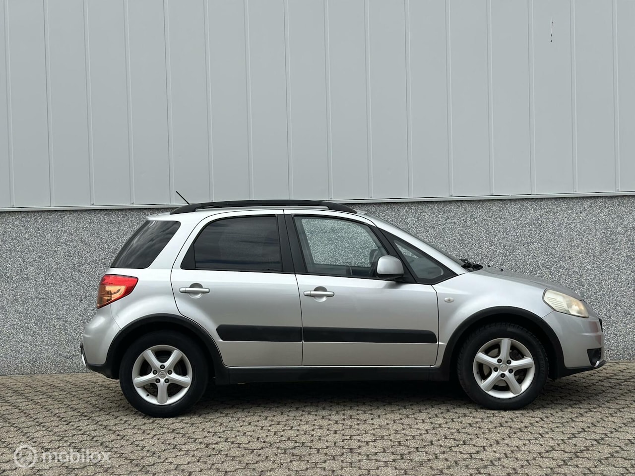 Suzuki SX4 - 1.6 Exclusive / Airco / Trekhaak/ New APK - AutoWereld.nl