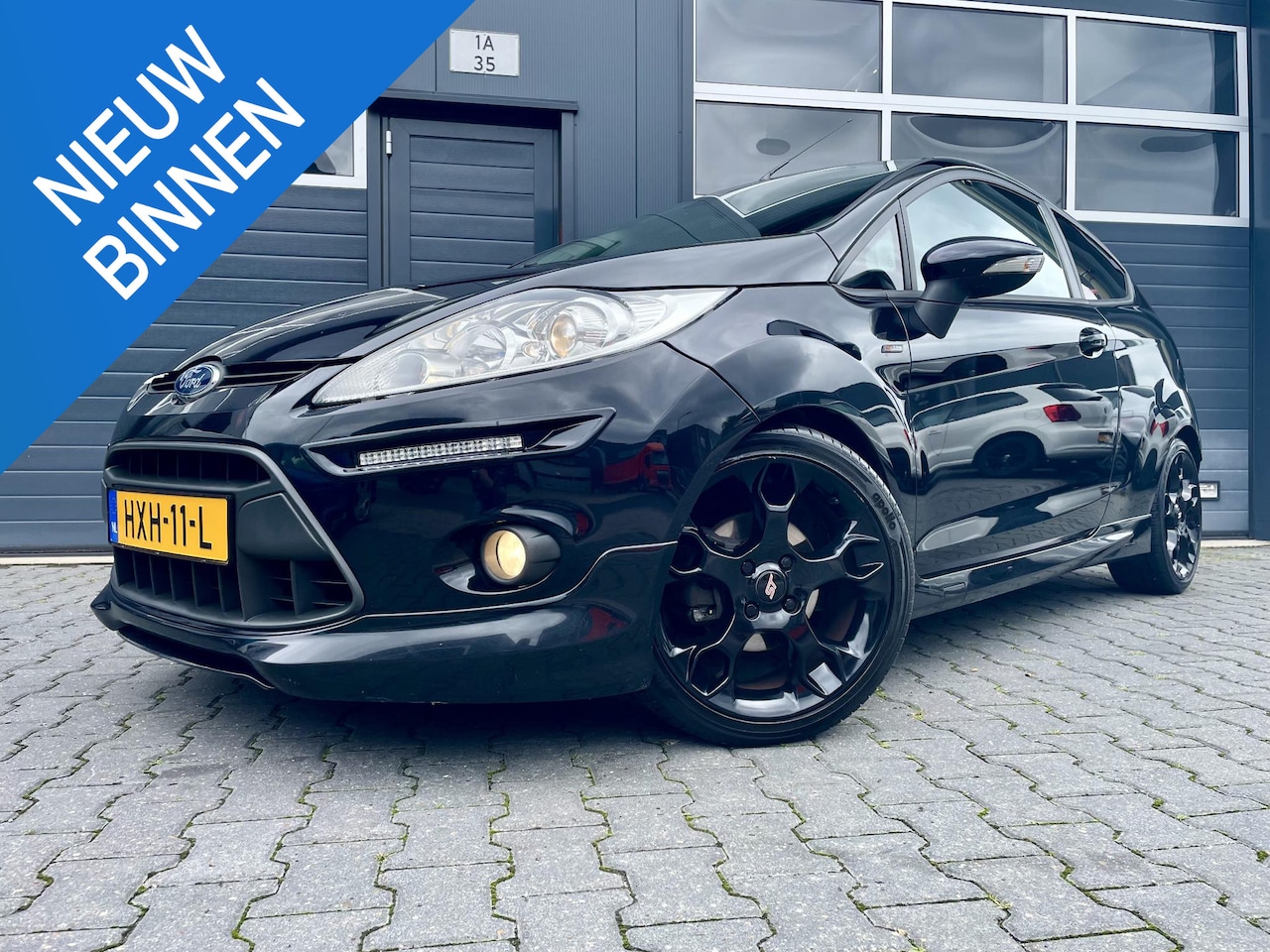 Ford Fiesta - 1.6 Sport *ST LINE*EIBACH*LEER*CRUISE*SPORTSOUND*ECC - AutoWereld.nl