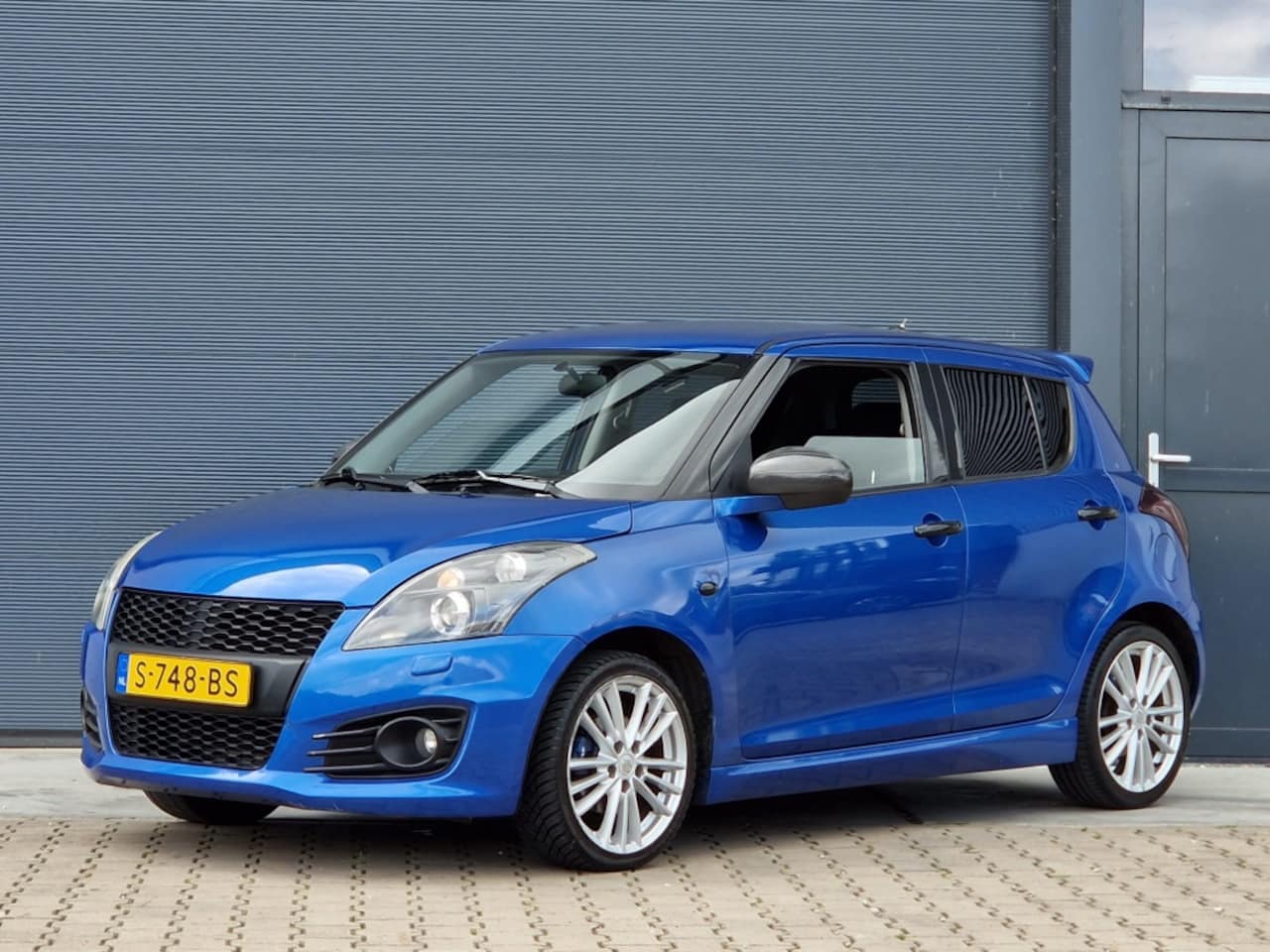 Suzuki Swift - 1.6 Sport carbon bomvol optie's - AutoWereld.nl