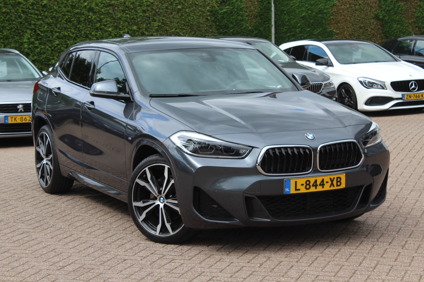 BMW X2 - sDrive20i High Exe. M Sport / Trekhaak / Camera / Alcantara bekleding / Keyless / 20'' / N - AutoWereld.nl
