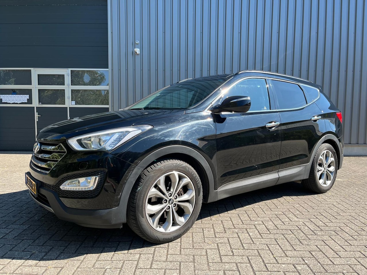 Hyundai Santa Fe - 2.2 CRDi 4WD i-Catcher 7p. PANODAK, LEDER, TREKHAK - AutoWereld.nl