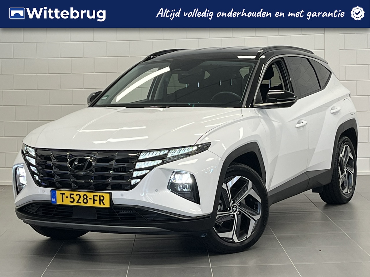 Hyundai Tucson - 1.6 T-GDI PHEV Comfort Smart 4WD NAVIGATIE | STOEL + STUURVERWARMING | TWO TONE | AUTOMATI - AutoWereld.nl