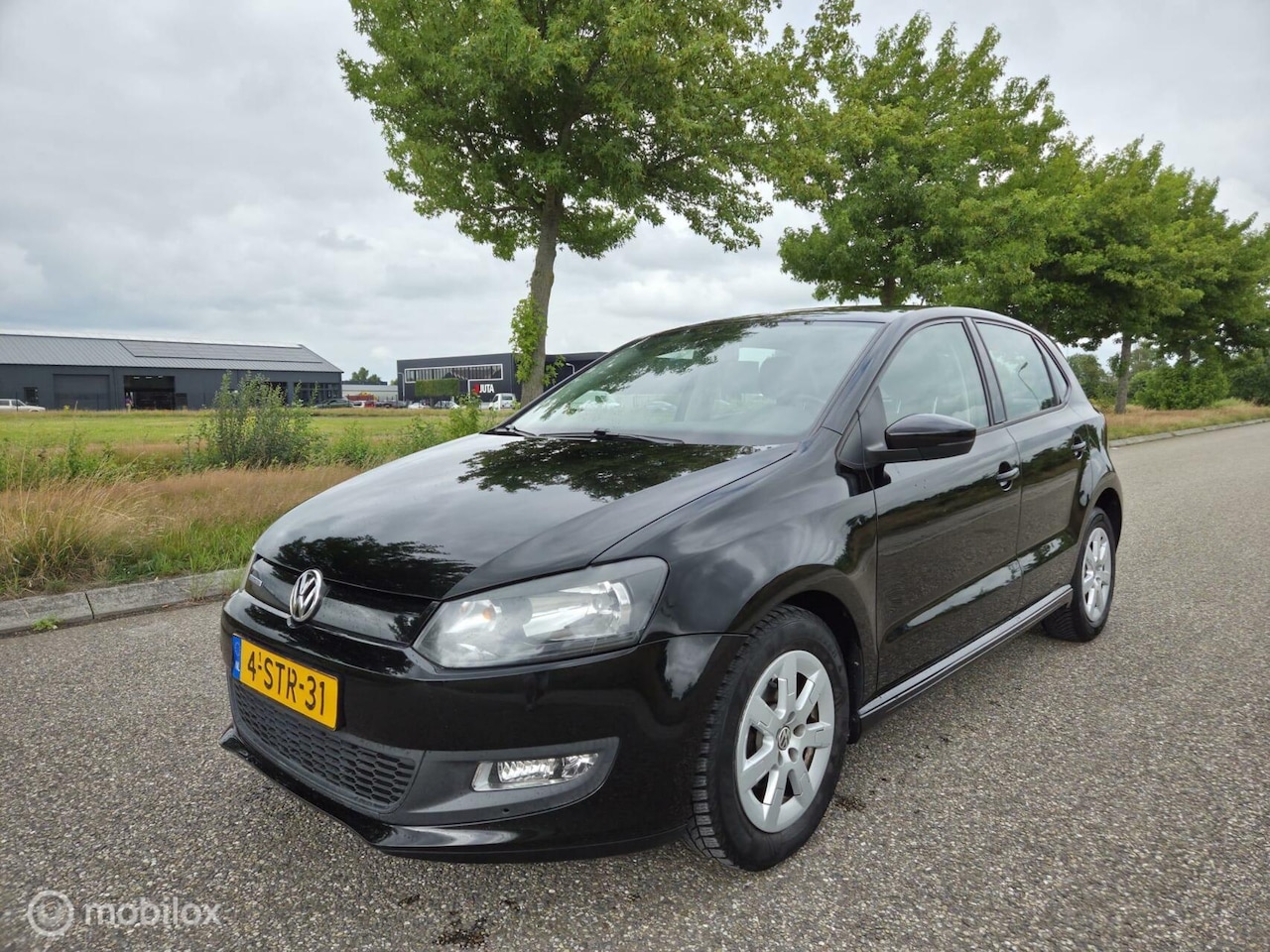 Volkswagen Polo - 1.2 TDI BlueMotion Trendline ZEER NETJES - AutoWereld.nl