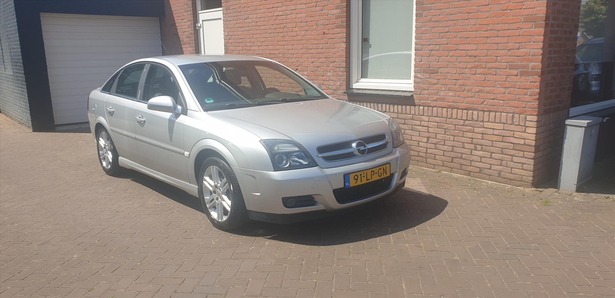 Opel Vectra - 2.2 I 16V HB Elegance - AutoWereld.nl