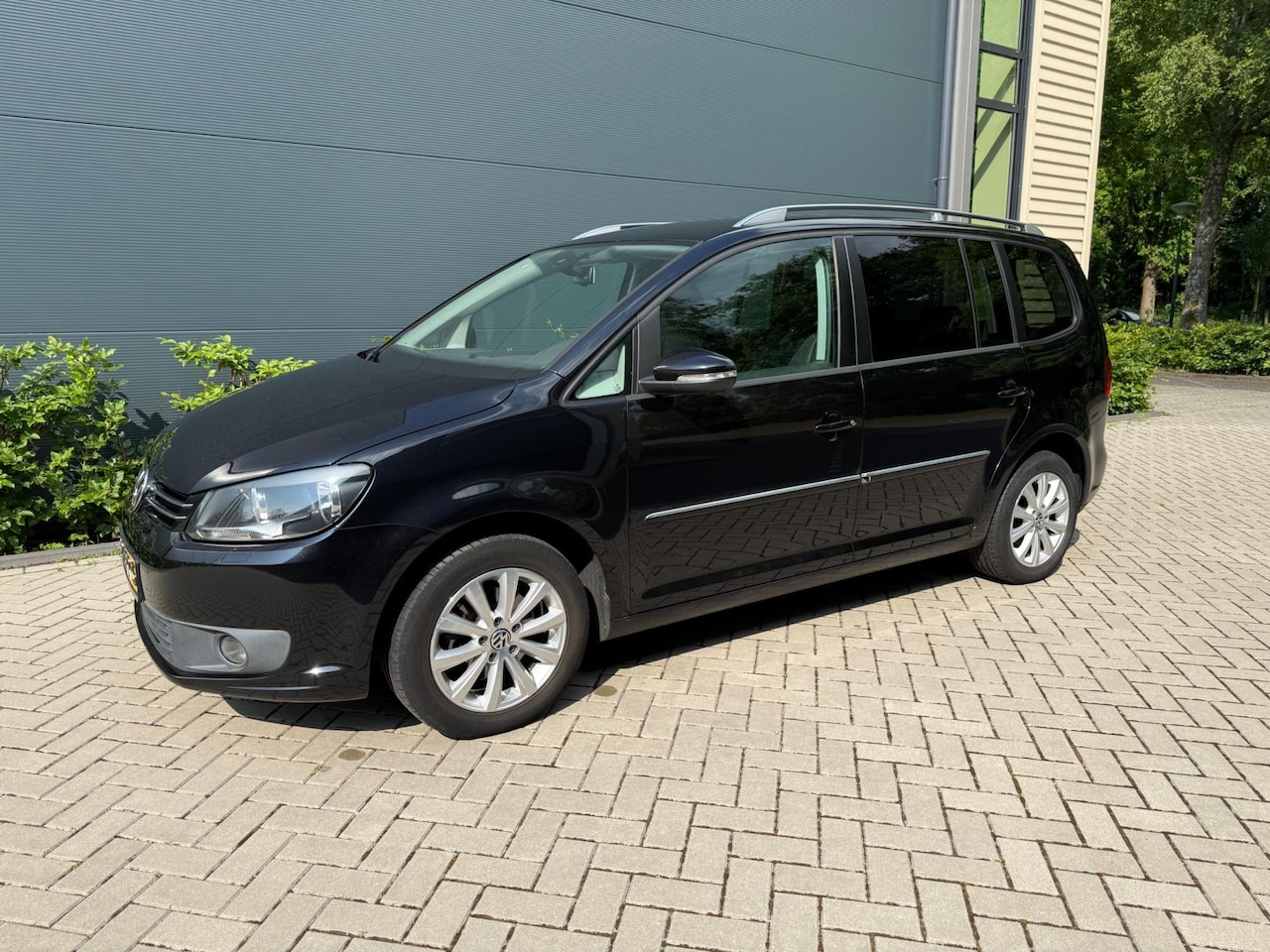 Volkswagen Touran - 1.2 TSI Highline BlueMotion 7p. 1.2 TSI Highline BlueMotion 7p. - AutoWereld.nl