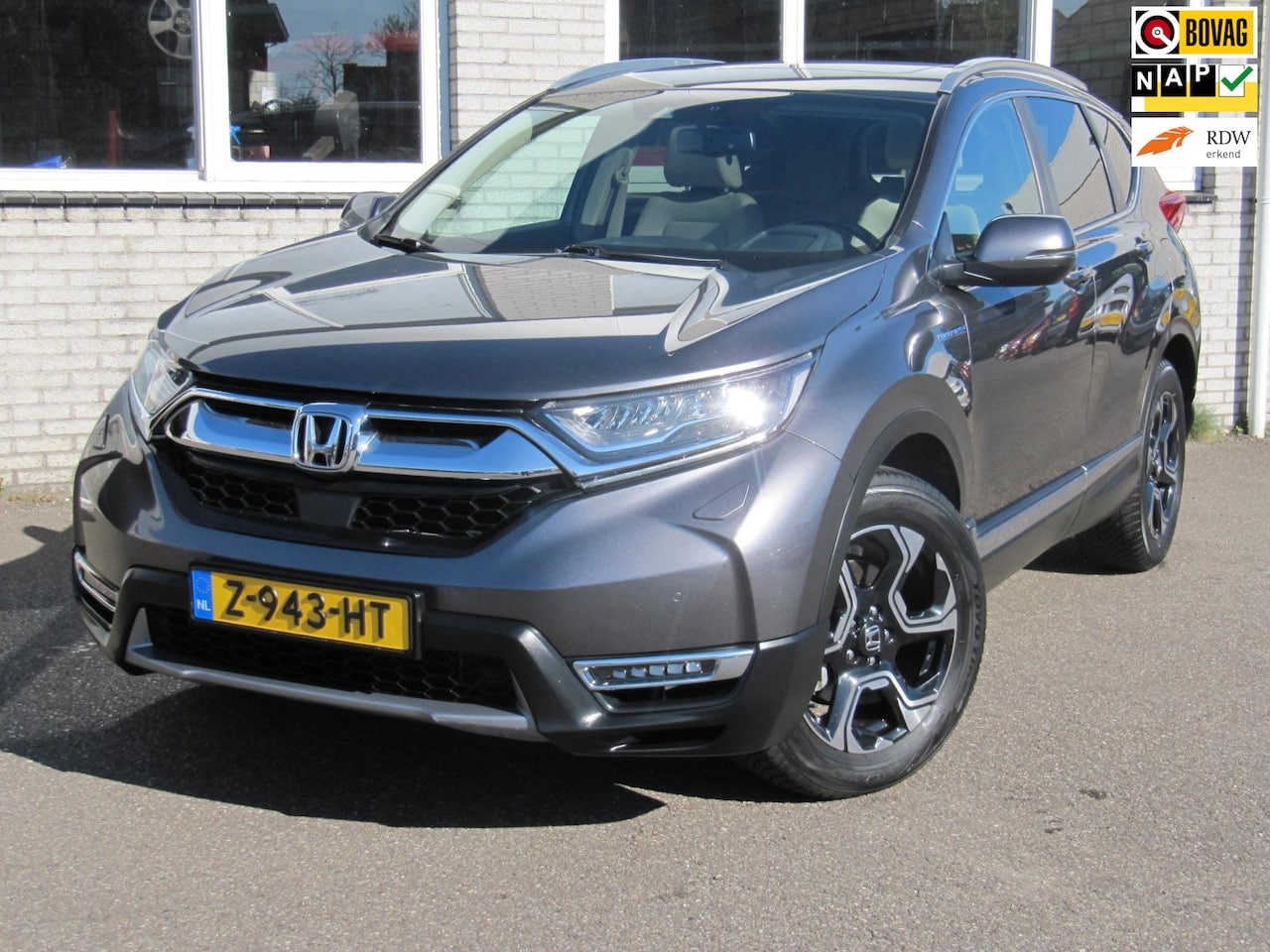 Honda CR-V - 2.0 Hybrid AWD Executive leder - AutoWereld.nl