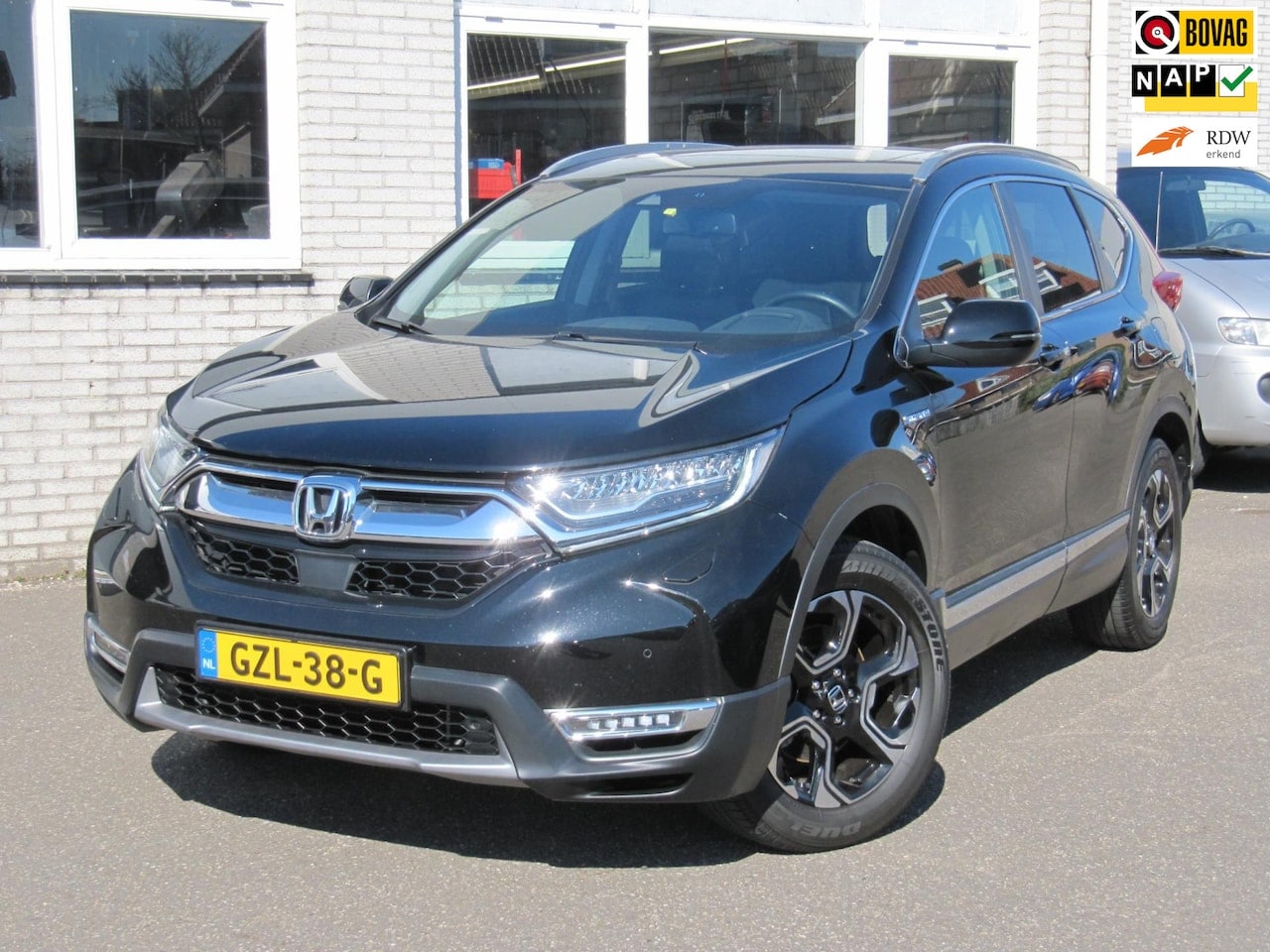 Honda CR-V - 2.0 Hybrid AWD Executive leder - AutoWereld.nl