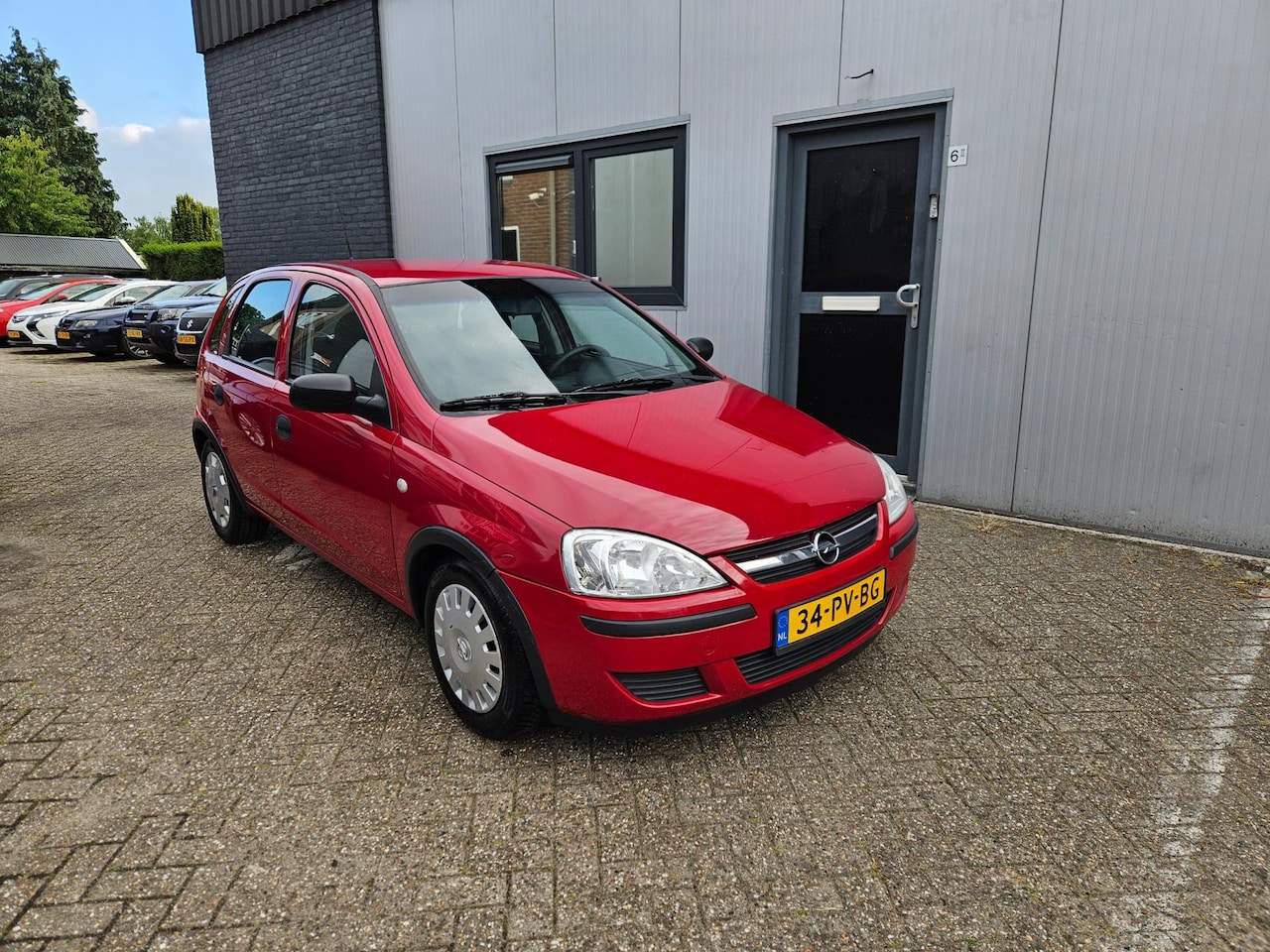 Opel Corsa - 1.0-12V Rhythm Lage km stand - AutoWereld.nl