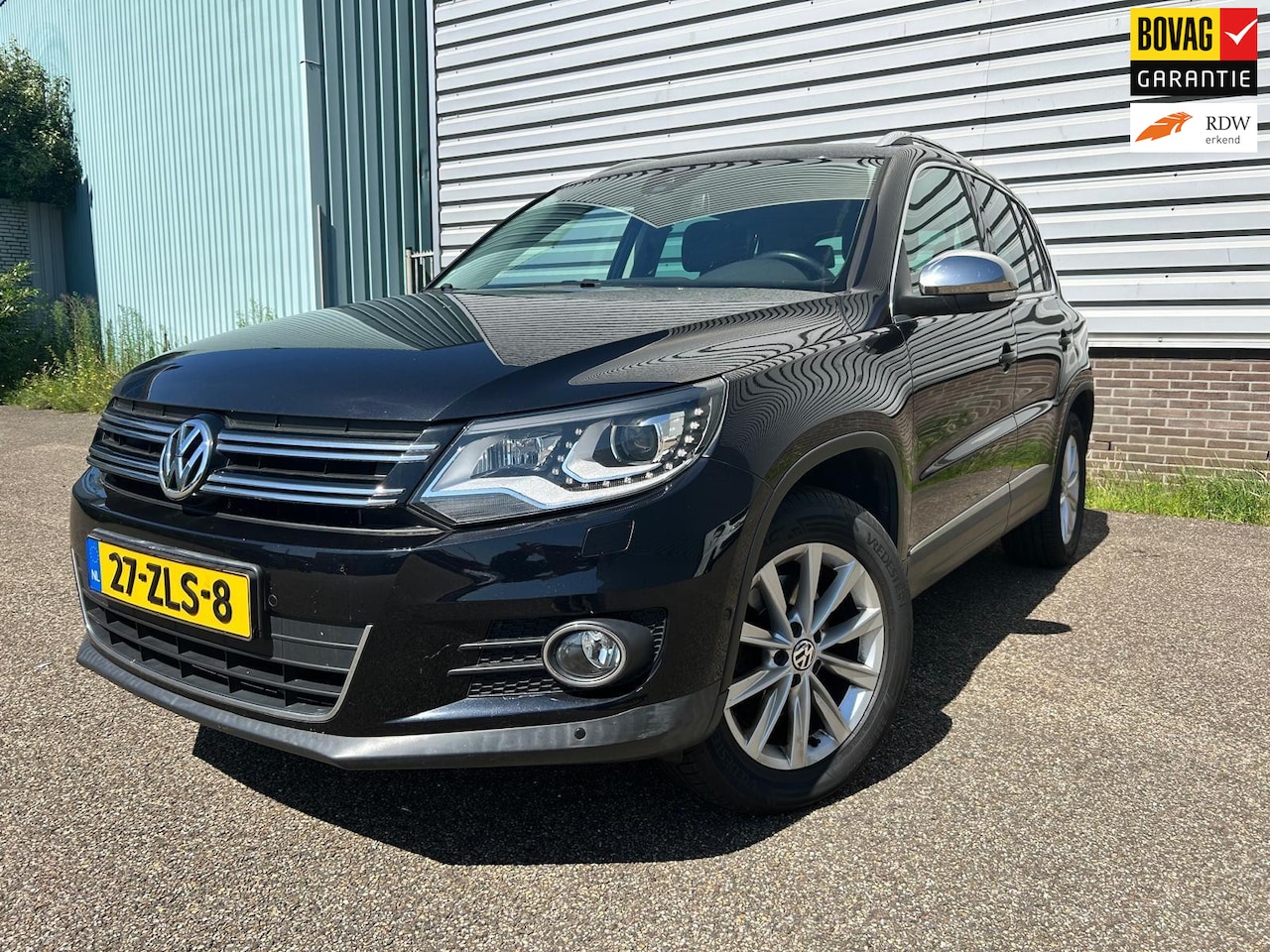 Volkswagen Tiguan - 2.0 TSI Sport&Style 4Motion Panoramadak - AutoWereld.nl