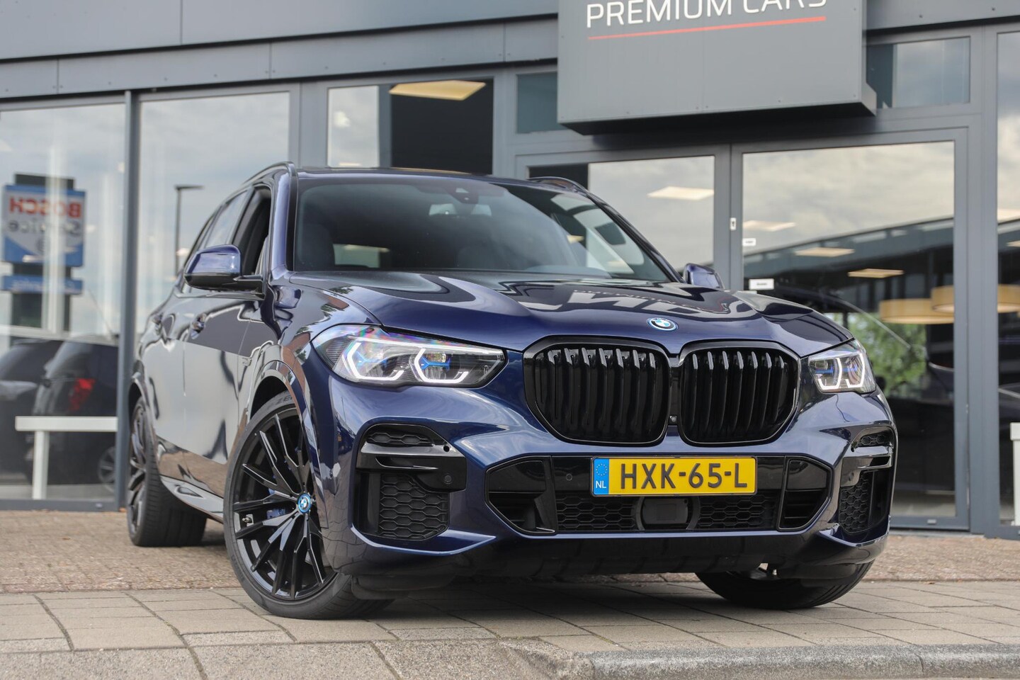 BMW X5 - xDrive45e High Executive | M-SPORT | Soft-close | Schuifdak | Trekhaak elektrisch - AutoWereld.nl