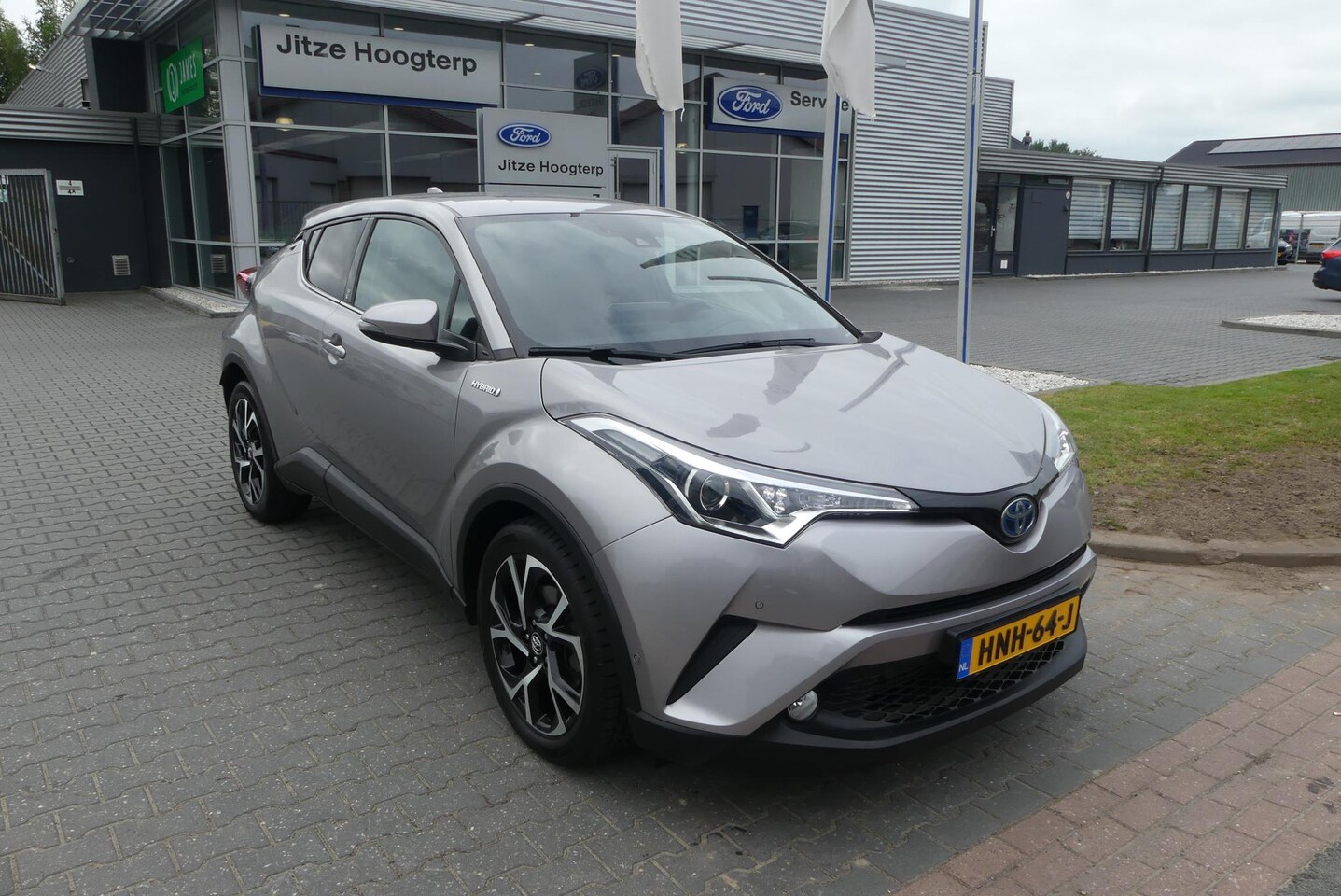 Toyota C-HR - 1.8 Hybrid Dynamic ADAPTIVE CRUISE, CLIMA, NAVI, STOEL/STUURVERWARMING, 32.313KM - AutoWereld.nl