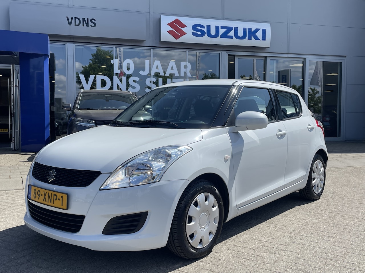Suzuki Swift - 1.2 Summer EASSS 1e EIGENAAR ! | Airco | Trekhaak | 5 drs | Stoelverwarming |   info;f.bog - AutoWereld.nl