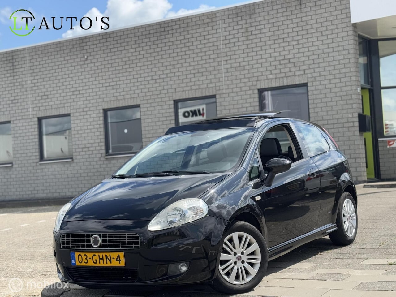 Fiat Grande Punto - 1.4 Dynamic|Panoramadak Cruise AC NAP - AutoWereld.nl