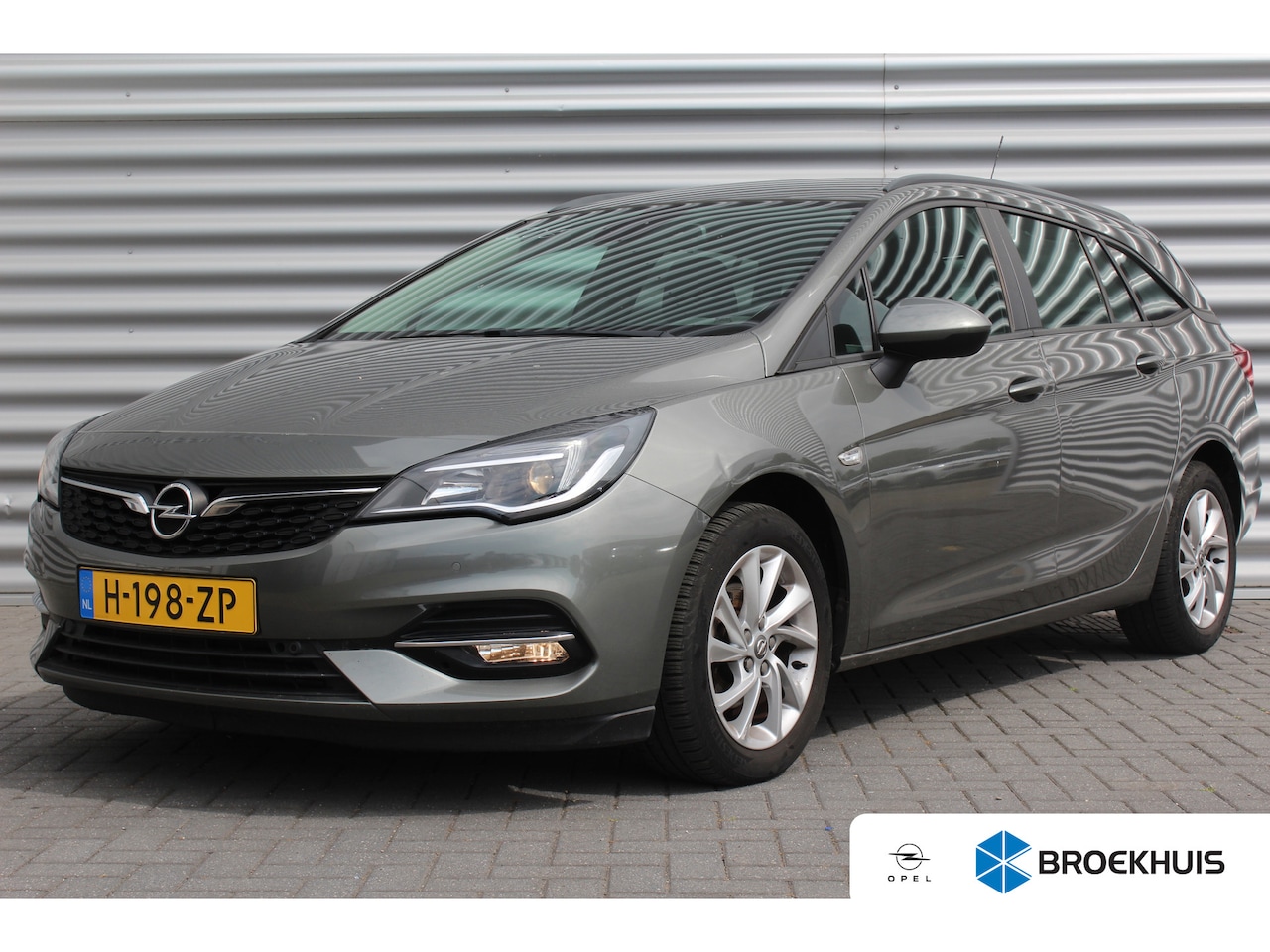 Opel Astra Sports Tourer - 1.2 TURBO 110PK EDITION+ / NAVI / CLIMA / AGR / PDC / 16" LMV / CAMERA / BLUETOOTH / CRUIS - AutoWereld.nl