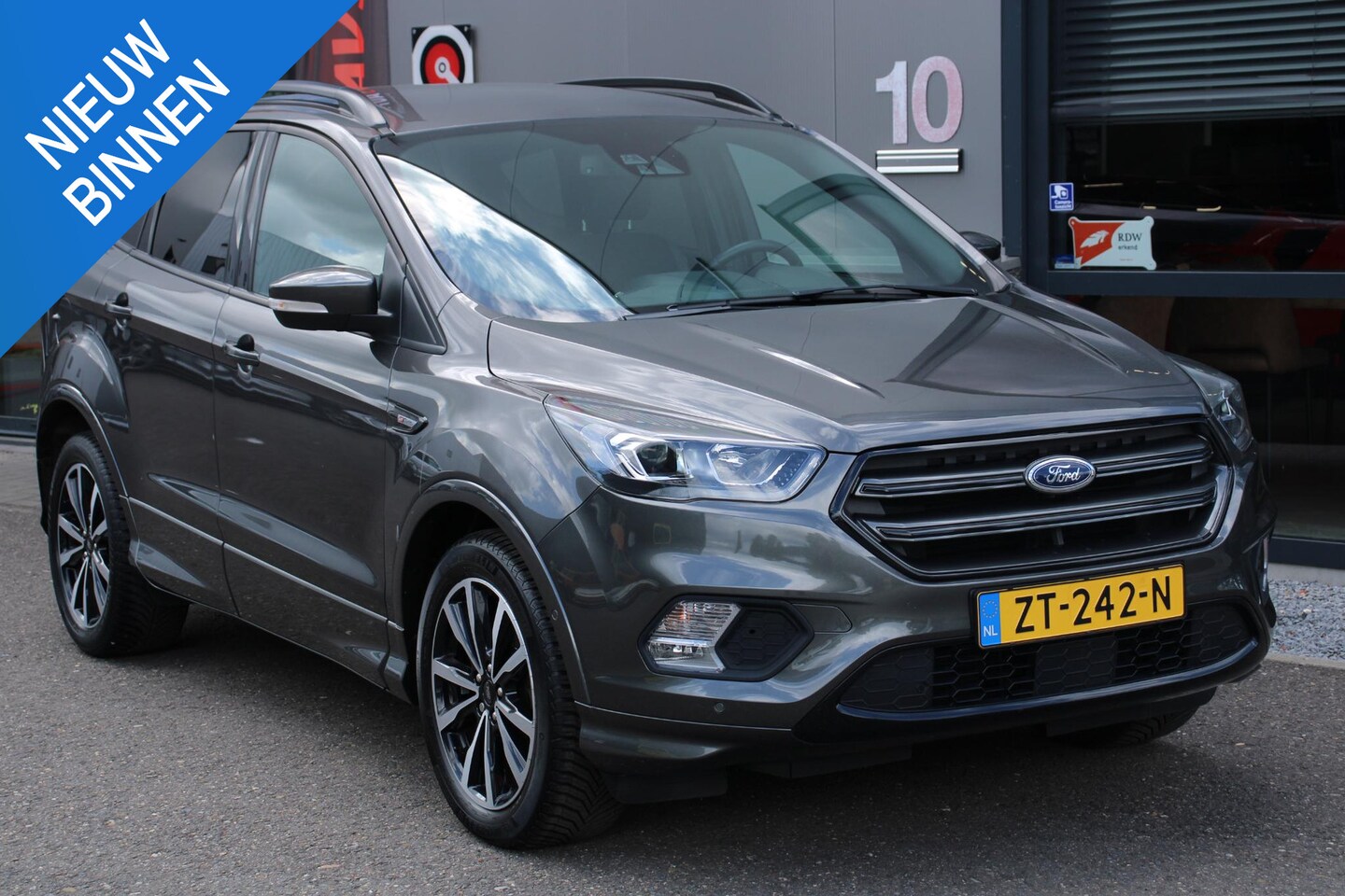 Ford Kuga - 1.5 EcoBoost ST Line 47DKM, STUUR, STOEL, VOORRUITVERWARMING - AutoWereld.nl