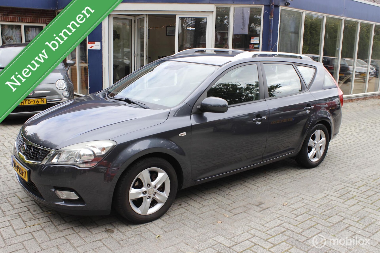Kia Cee'd Sporty Wagon - 1.4 CVVT Seven 1.4 CVVT Seven - AutoWereld.nl