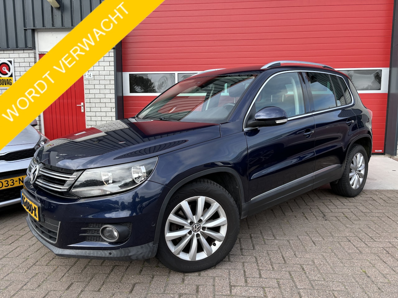 Volkswagen Tiguan - 1.4 TSI Sport&Style TREKHAAK / NAVI / CLIMA / PDC / BLUETOOTH / CRUISE / NL-AUTO - AutoWereld.nl