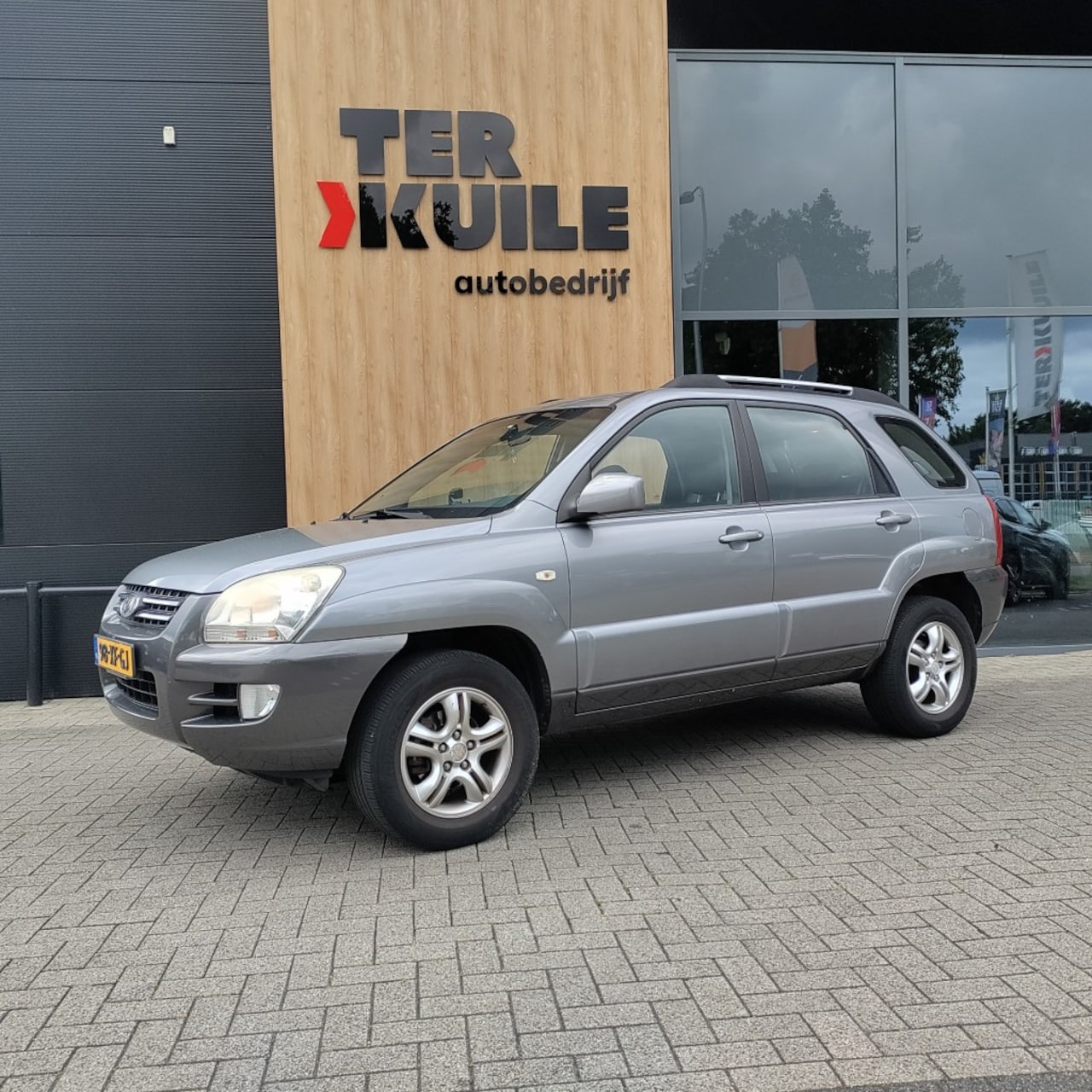 Kia Sportage - 2.0 CVVT X-ecutive 2.0 CVVT X-ECUTIVE - AutoWereld.nl