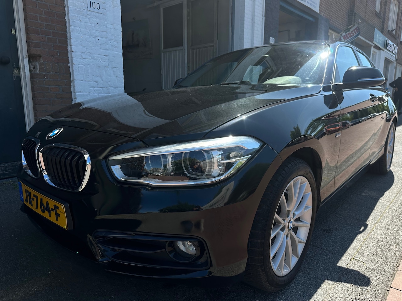 BMW 1-serie - 118i AUTOMAAT Clima Cruise PDC LMV met apk en beurt geleverd - AutoWereld.nl