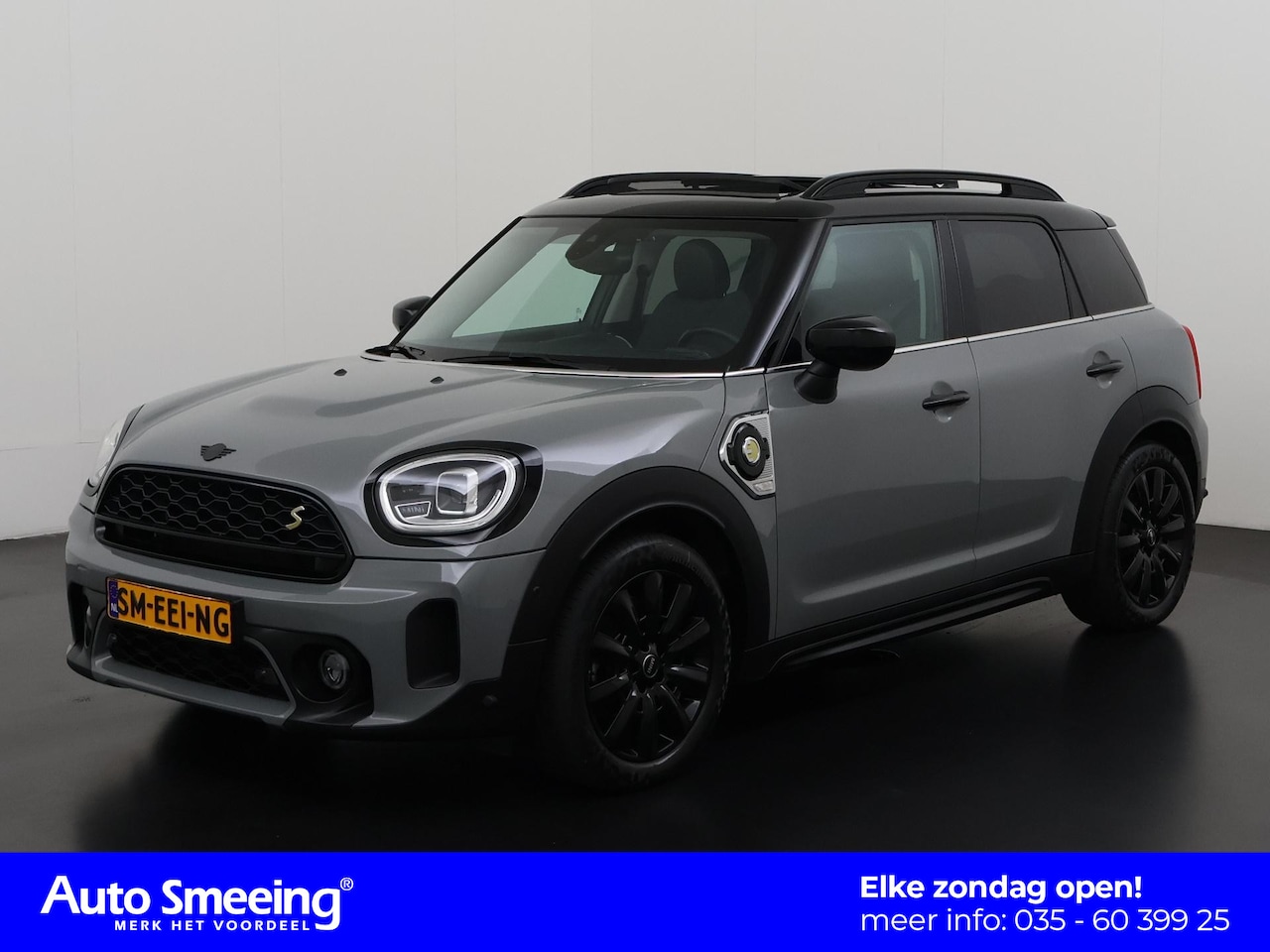MINI Countryman - Mini Cooper S E ALL4 Black | Panoramadak | Harman/Kardon | Head-up | Camera | Zondag open! - AutoWereld.nl