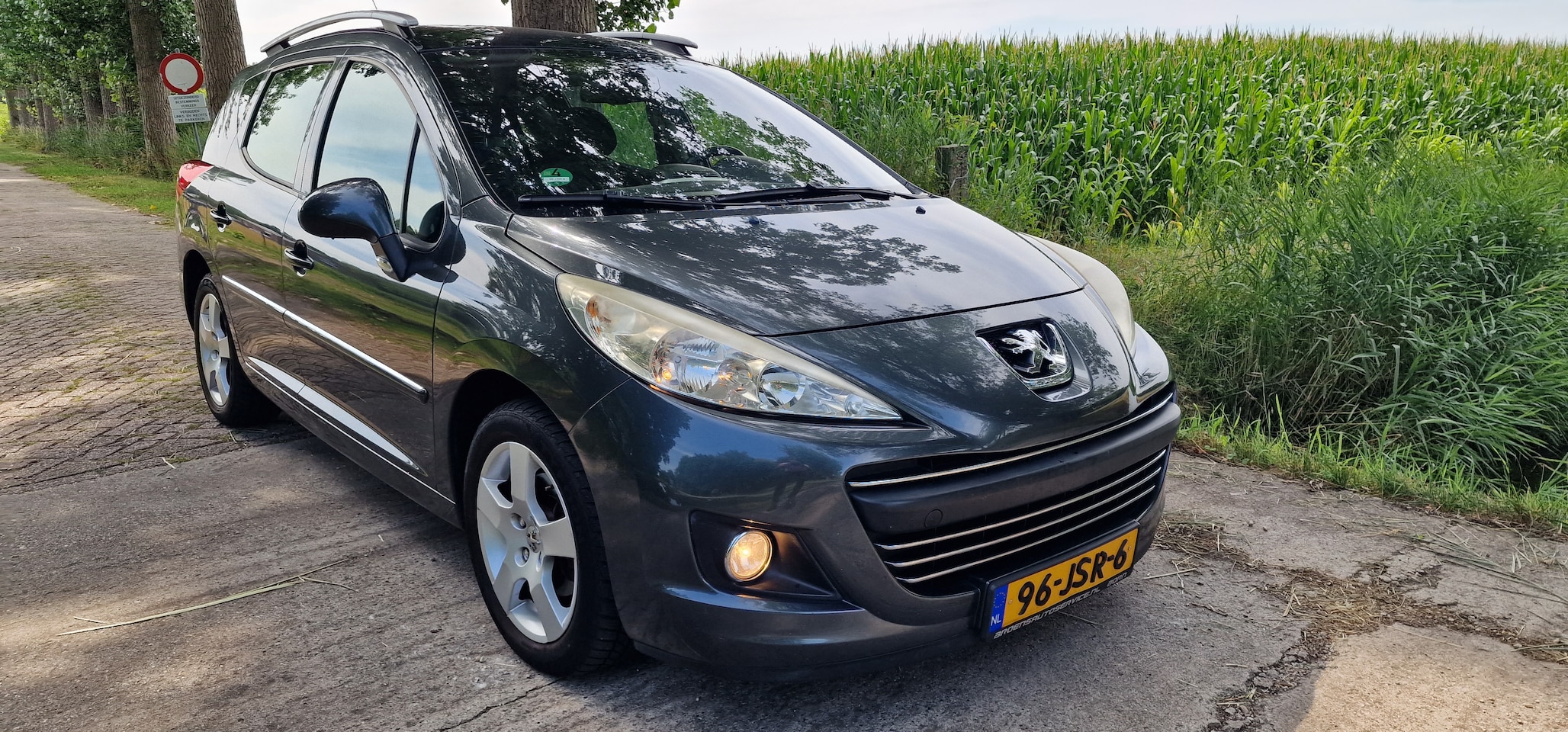 Peugeot 207 SW - 1.6 VTi Première Handel / export. Peugeot 207 1.6 16V SW. Navi, Cruise, panodak,  apk 5 2026 - AutoWereld.nl
