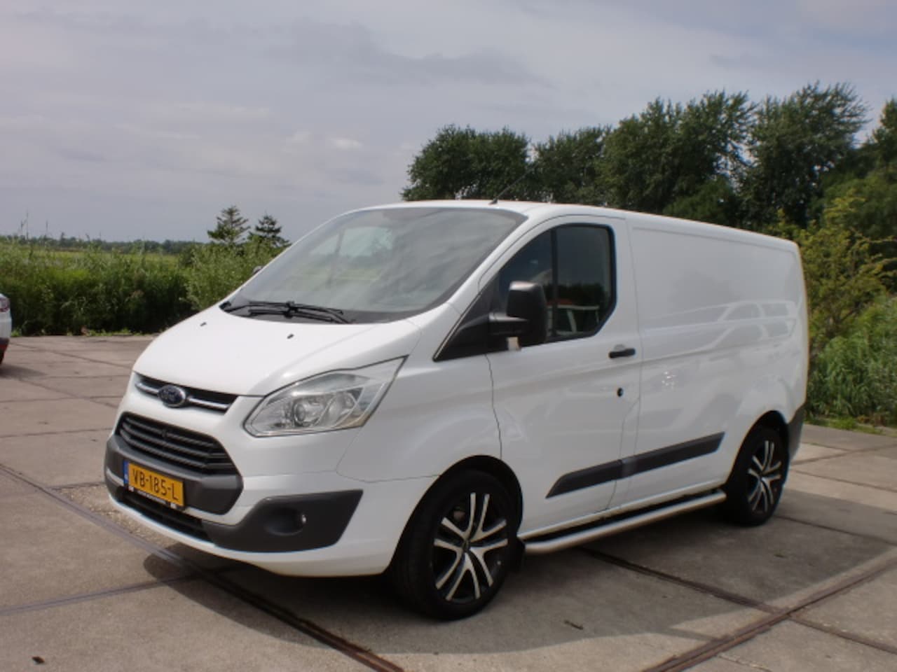 Ford Transit Custom - 2.2 TDCI BJ 2013 AIRCO SIDESKIRST L.M.V. CRUISE NAP - AutoWereld.nl