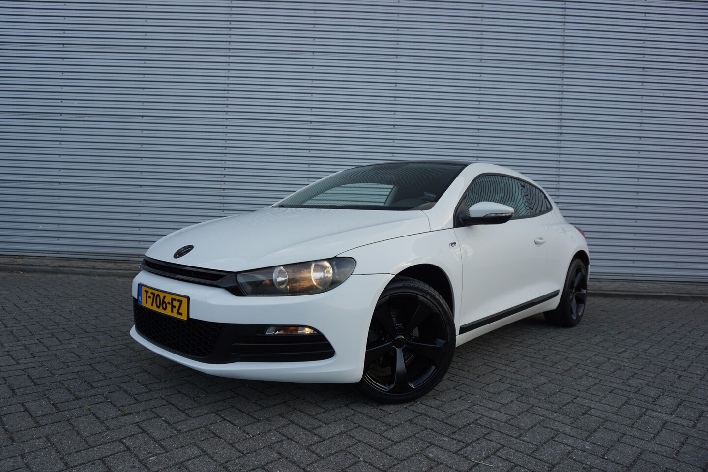 Volkswagen Scirocco - 1.4 TSI Airco / Navi / Cruise / Elektr. ramen / Sportuitlaat / Lm velgen - AutoWereld.nl