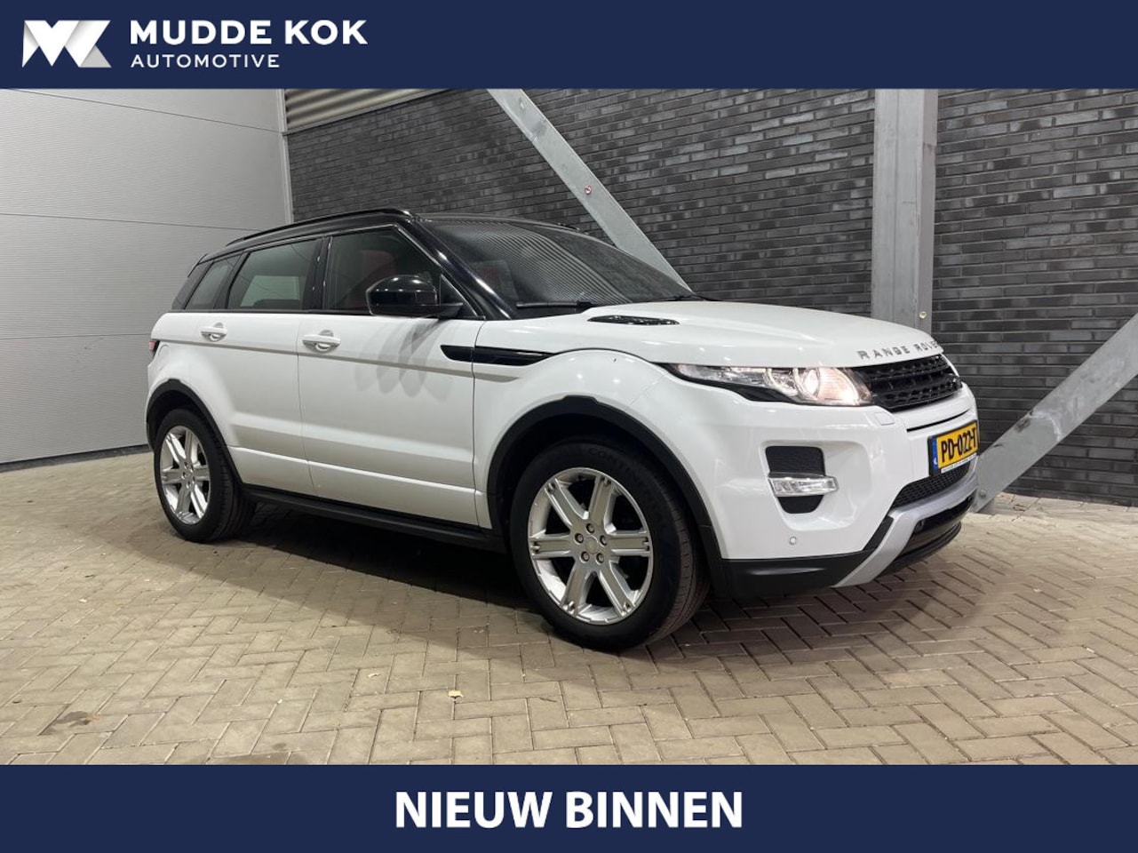 Land Rover Range Rover Evoque - 2.0 Si 4WD Sicilian Yellow | Panoramadak | Leder | Trekhaak | Camera | Meridian - AutoWereld.nl