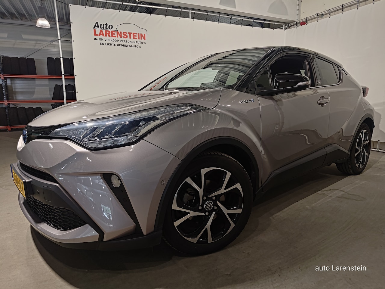 Toyota C-HR - 2.0 Hybrid 184pk Bi-Tone A.Camera / Navi / Carplay / Winter Pack - AutoWereld.nl