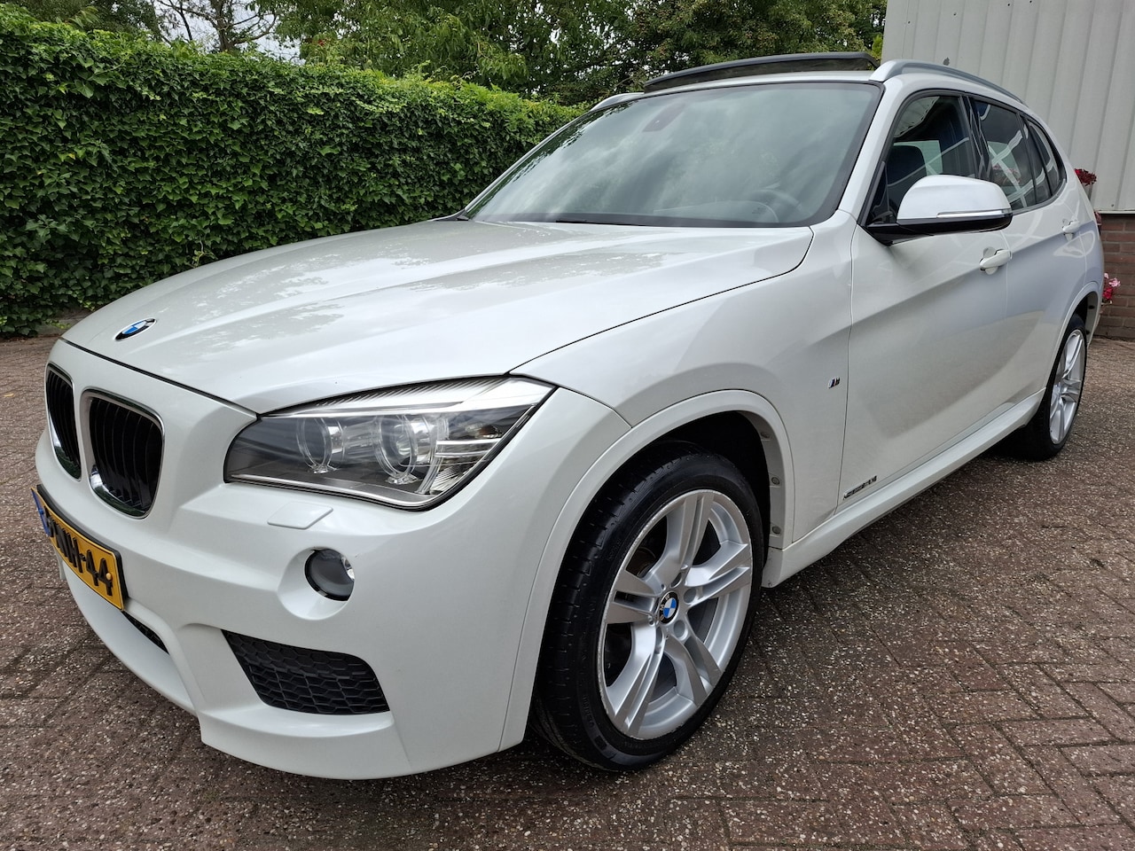 BMW X1 - sDrive20i High Executive PANODAK/LEER/CRUISE/NAVI 184PK - AutoWereld.nl