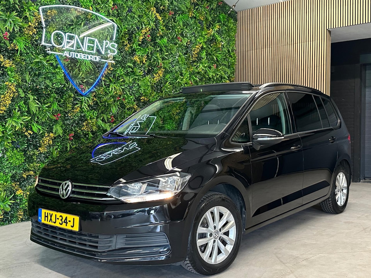 Volkswagen Touran - 1.4 TSI Comfortline 7p / Pano / Cruise / PDC - AutoWereld.nl