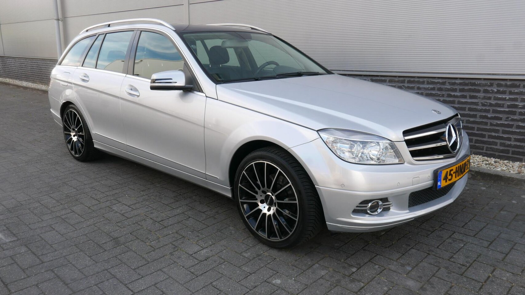 Mercedes-Benz C-klasse Estate - 180 K 156 PK Business Class NAVI,LEER,CLIMA,TREKHAAK. - AutoWereld.nl