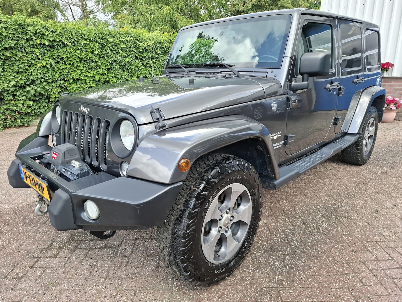 Jeep Wrangler - 2.8 CRD Sahara LIER/LEER/CLIMAT/CRUISE/TREKHAAK 200PK - AutoWereld.nl