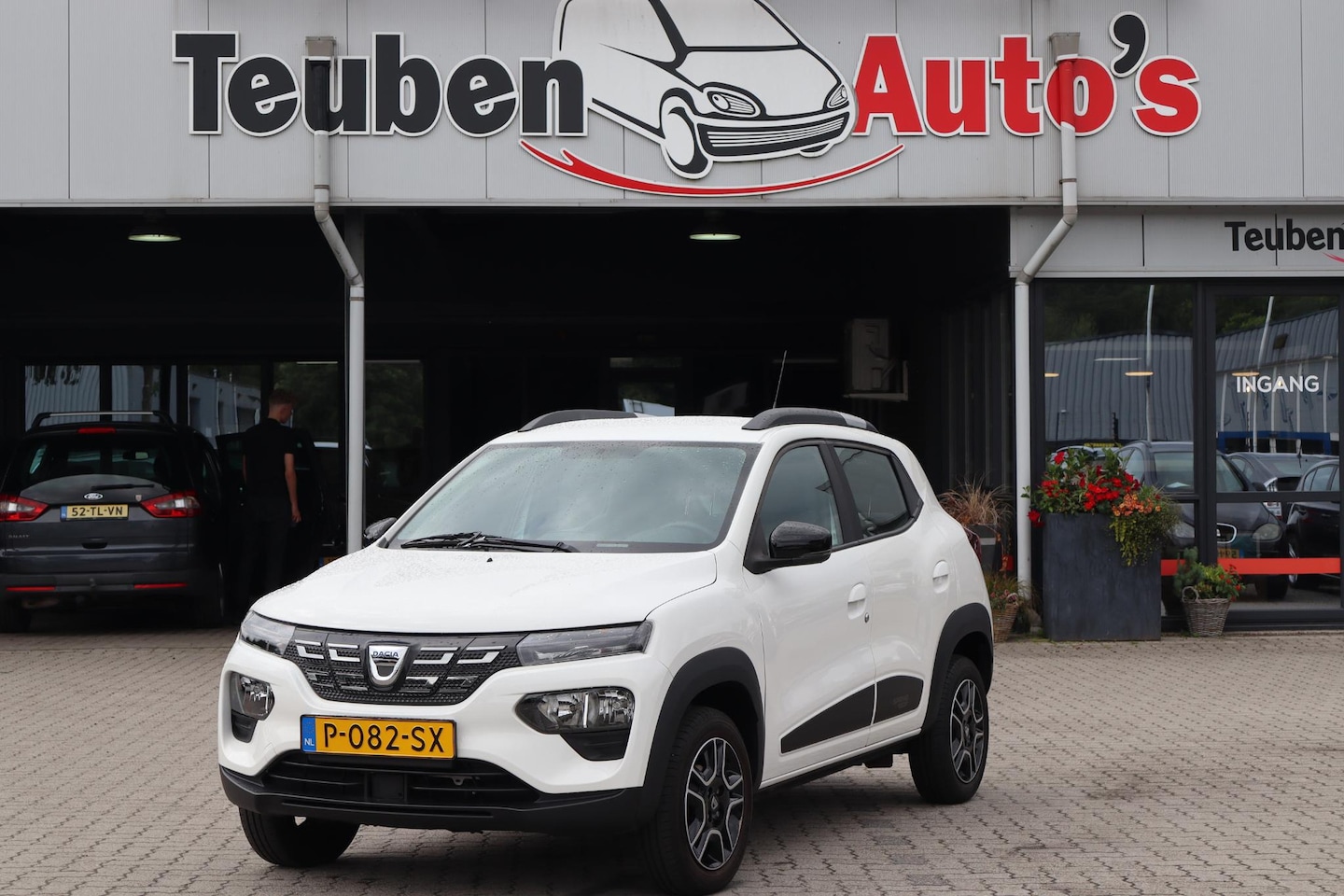 Dacia Spring - Comfort Plus (Orange Pack) 27 kWh 95% SOH, Camera, Airco, BTW auto, Navigatie - AutoWereld.nl