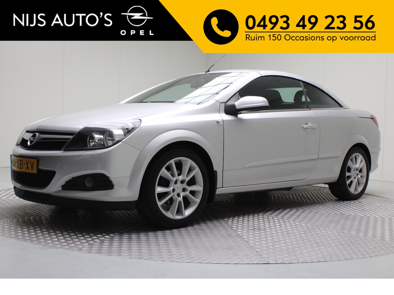 Opel Astra TwinTop - 1.6 Enjoy | afneembare trekhaak | airco | radio cd | nl auto - AutoWereld.nl