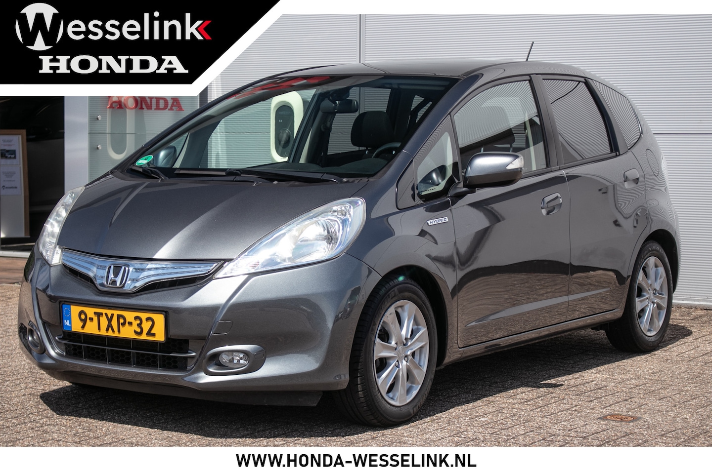 Honda Jazz - 1.4 Hybrid Elegance All-in rijklaarprijs | Panodak | Clima | Cruise - AutoWereld.nl
